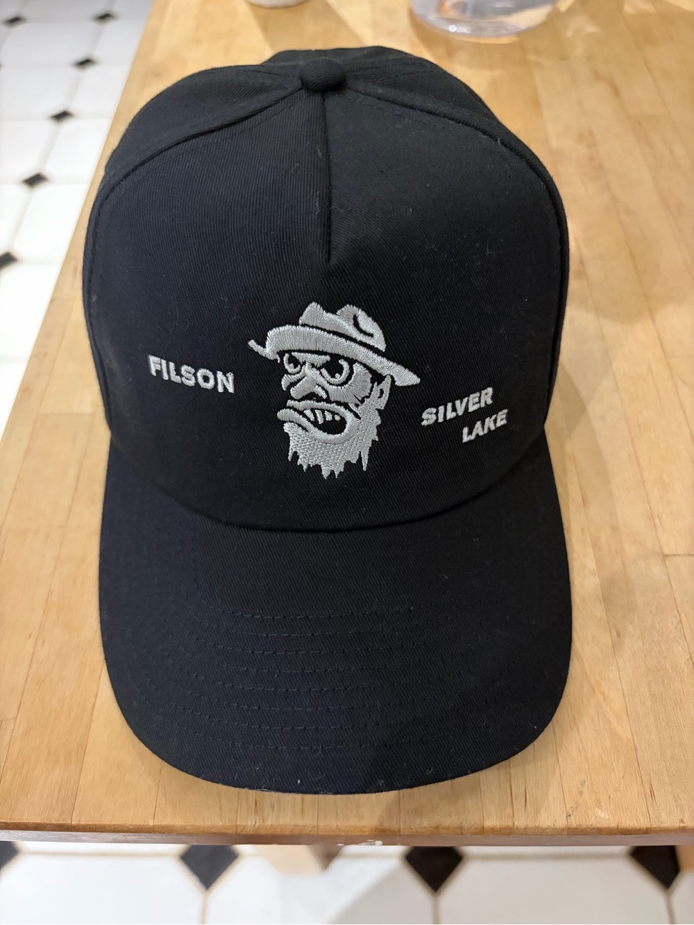 Filson Black Cap with White Embroidered Character Logo